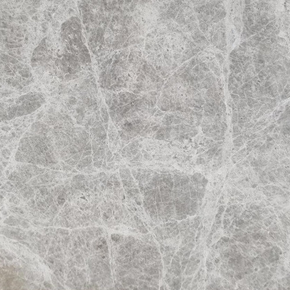Mármol Splendor Grey de color gris medio y vetas en tonos más claras.
