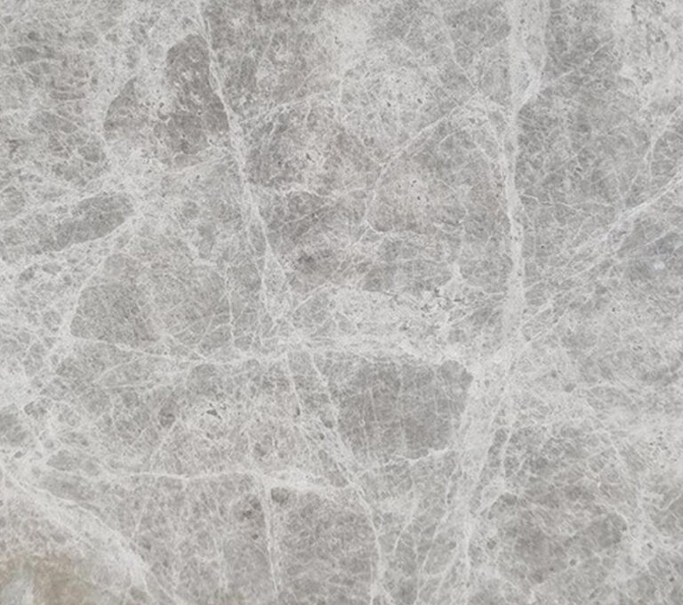 Mármol Splendor Grey de color gris medio y vetas en tonos más claras.